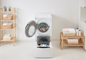 מכבשת - מכונת כביסה וייבוש LG. 
